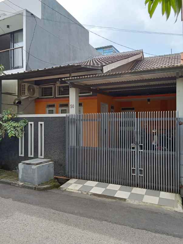 dijual rumah bumi adipura cluster cempaka