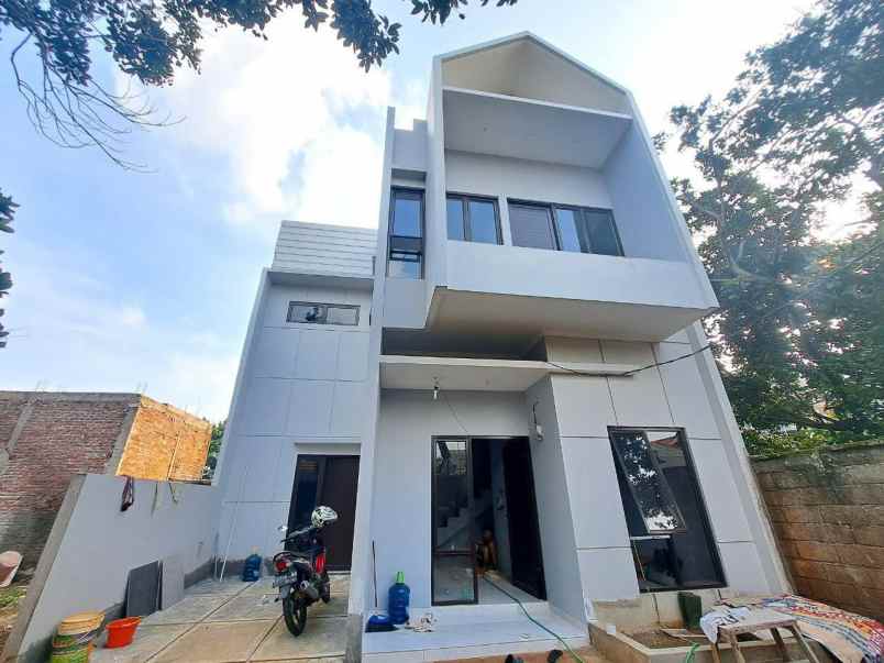 dijual rumah cluster dekat jalan raya