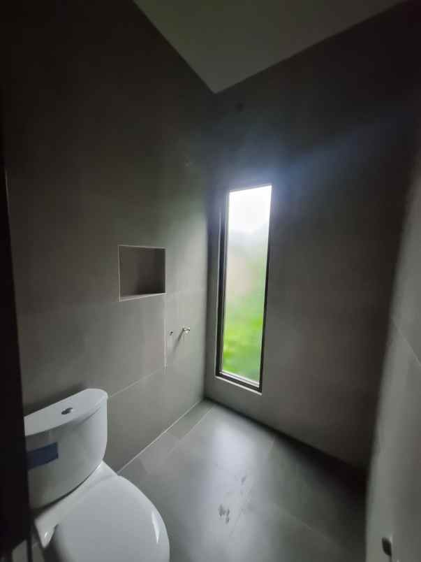 dijual rumah cluster dekat jalan raya