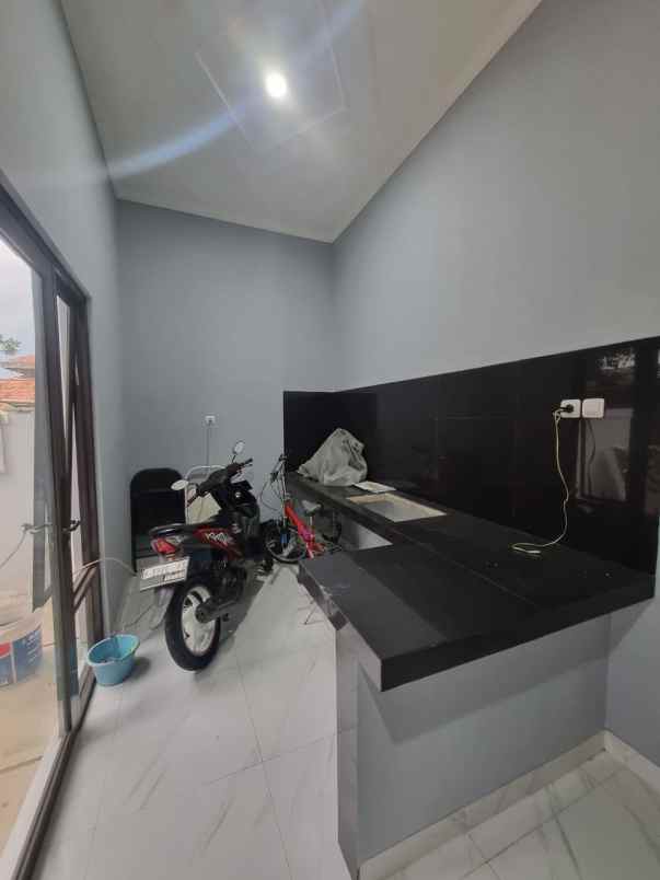 dijual rumah cluster dekat jalan raya