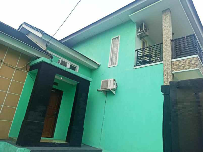 dijual rumah dalam perumahan maharaja depok bbs banjir