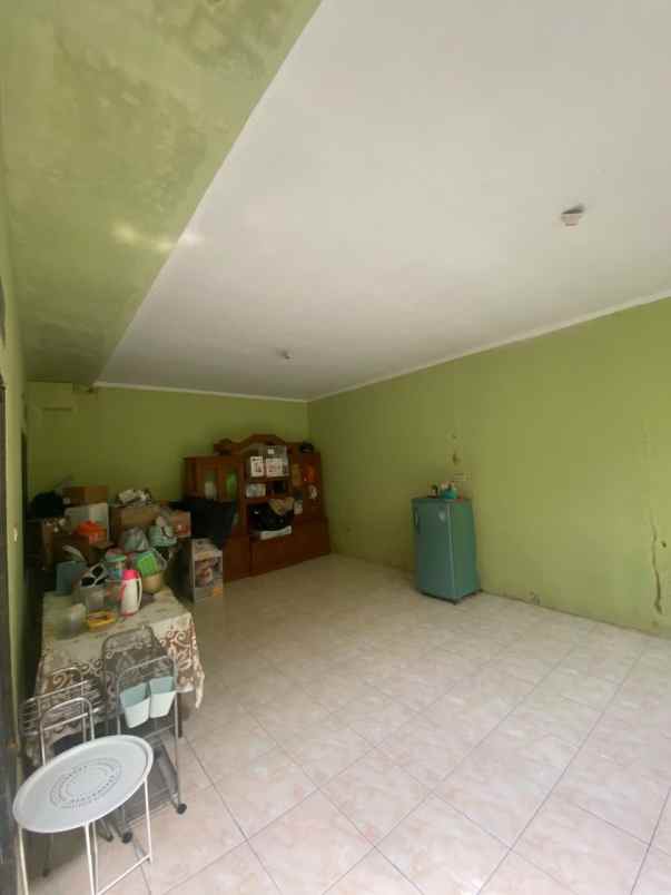 dijual rumah perum kota permata