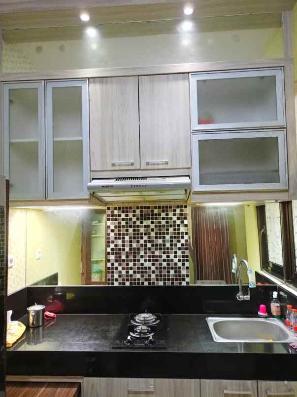 disewakan rumah pantai mentari