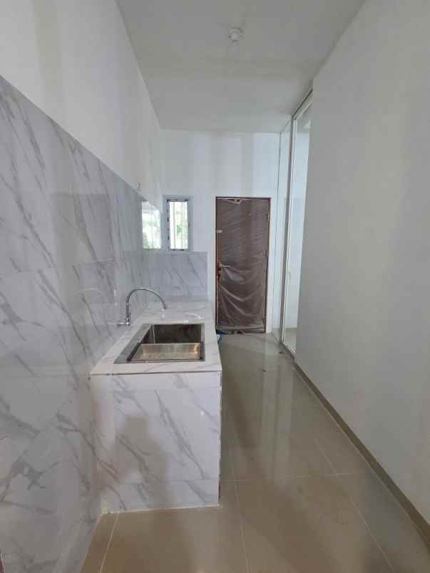 rumah pakuwon indah mansion siap huni