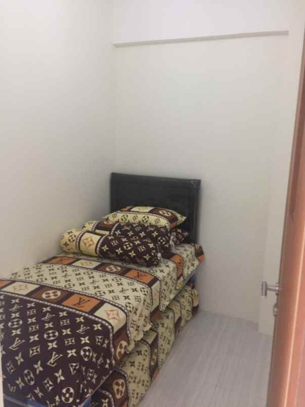 apartmen puncak dharmahusada ada ac 2 lt 26