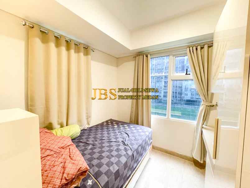 dijual apartemen podomoro city deli tower