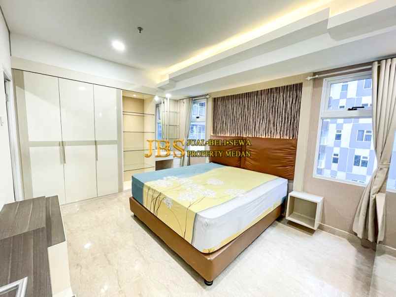 dijual apartemen podomoro city deli tower