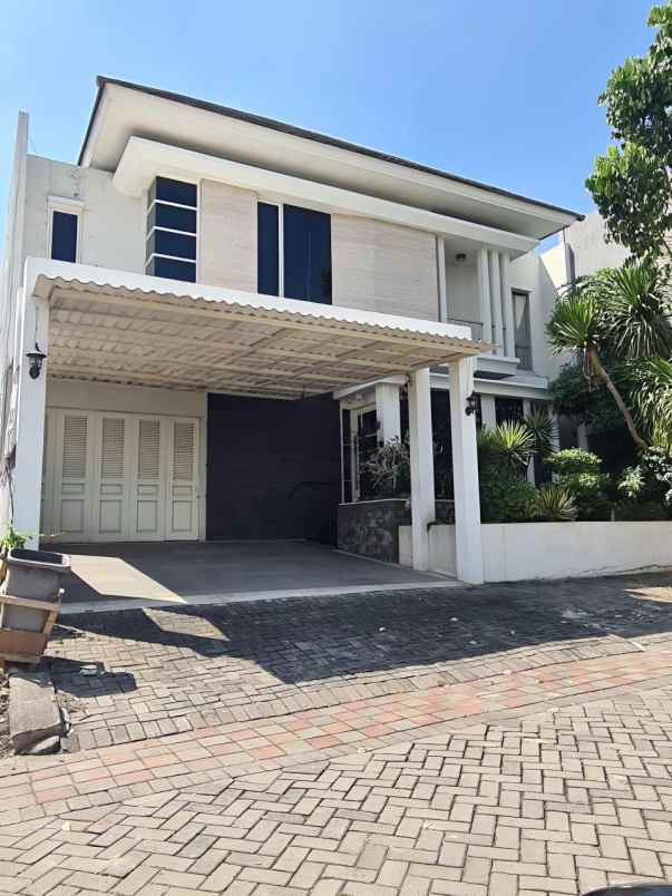 dijual rumah citraland raffles garden