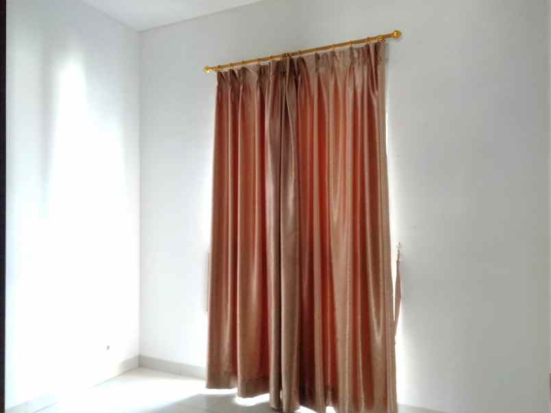 dijual rumah cluster palm spring jgc