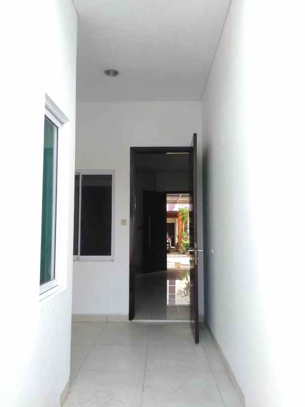 dijual rumah cluster palm spring jgc