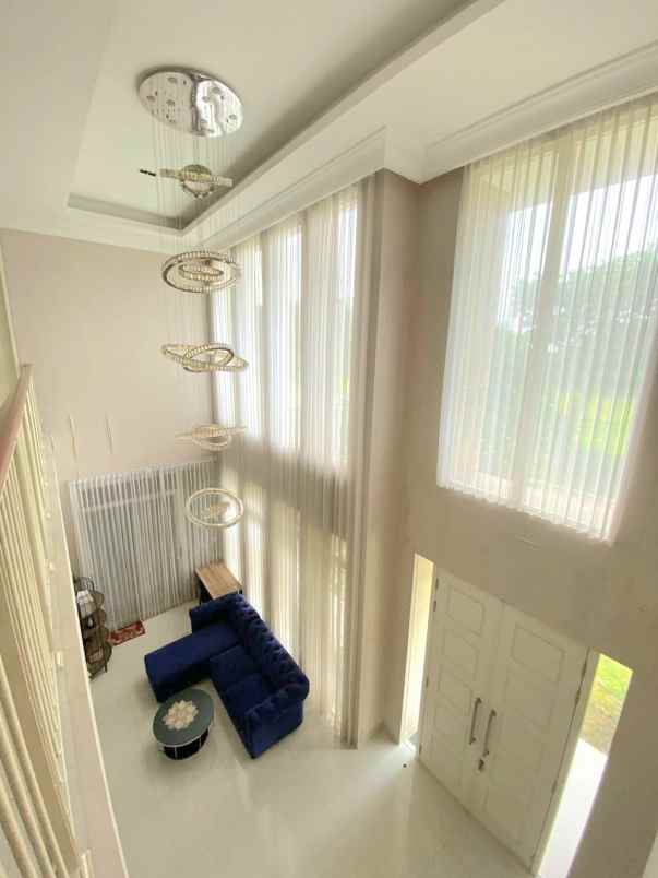 dijual rumah pakuwon city grand island