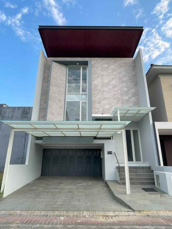 rumah baru grand island pakuwon city surabaya