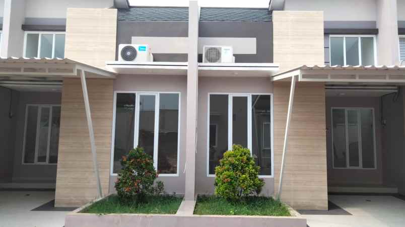 rumah jl reni jaya barat 4 no 8