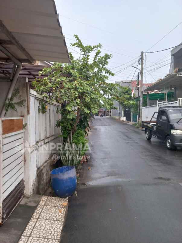 rumah second 2 lantai siap huni di serua tang sel