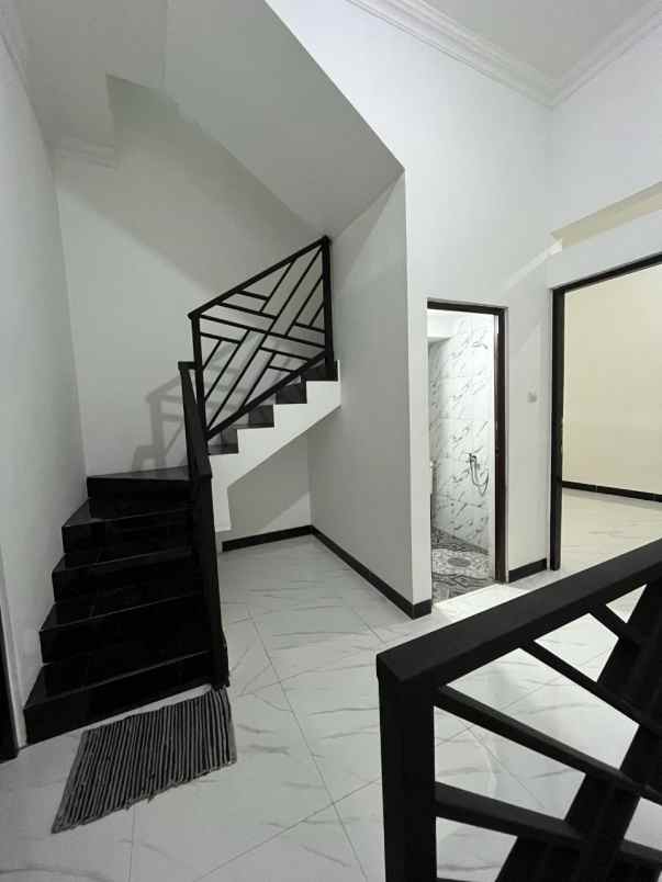 townhouse 3 lantai dengan rooftop di batu ampar