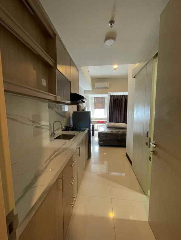 apartemen amor lt 23 studio full furnish baru gress