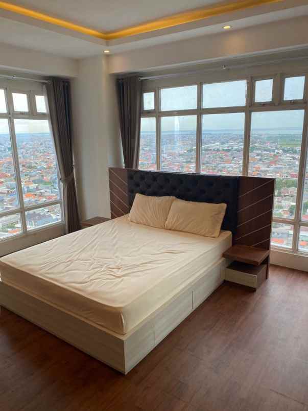 apartemen puncak darmahusada doble view kaca keliling