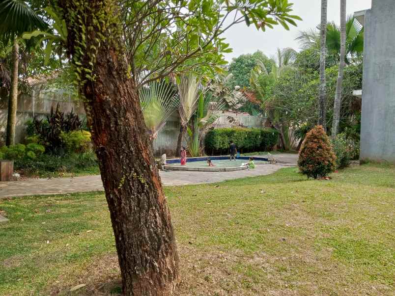 dijual rumah dekat taman kota 2