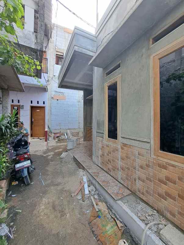 dijual rumah duren sawit