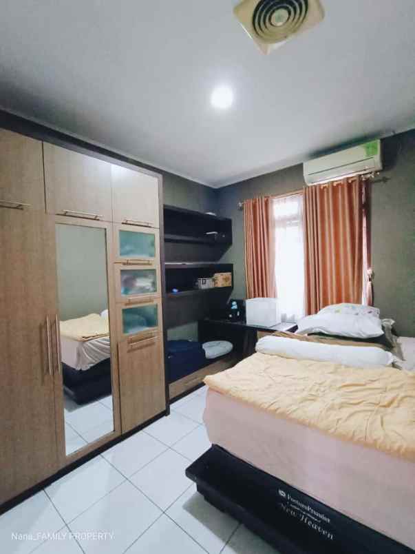 dijual rumah jalan raya permata hijau 2