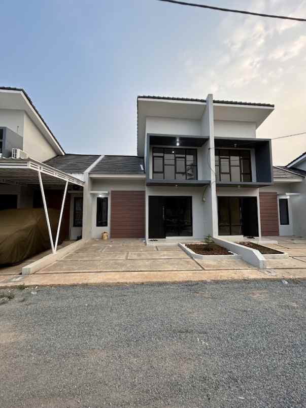 dijual rumah jl raya cisaat setu