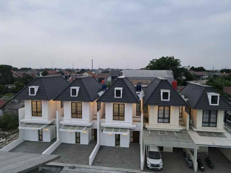 dijual rumah jln h mughni jatimekar