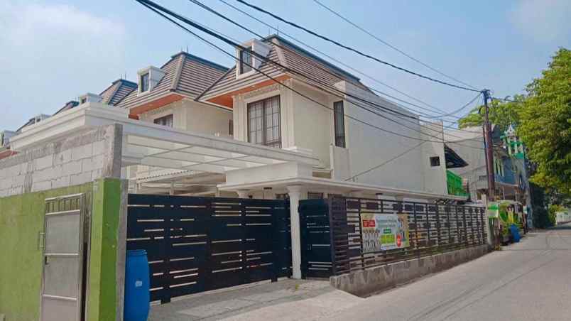 dijual rumah jln h mughni jatimekar