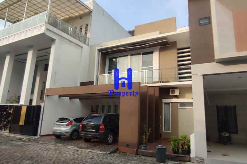 dijual rumah komplek graha sunggal