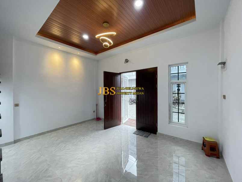 dijual rumah komplek mados royal suite