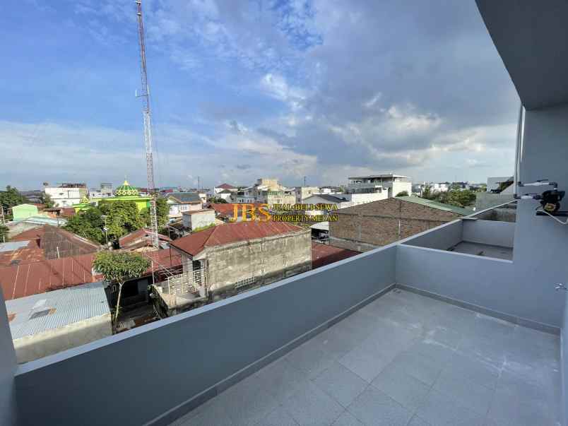 dijual rumah komplek mados royal suite