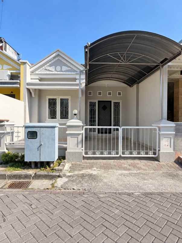 dijual rumah pakuwon city cluster taman