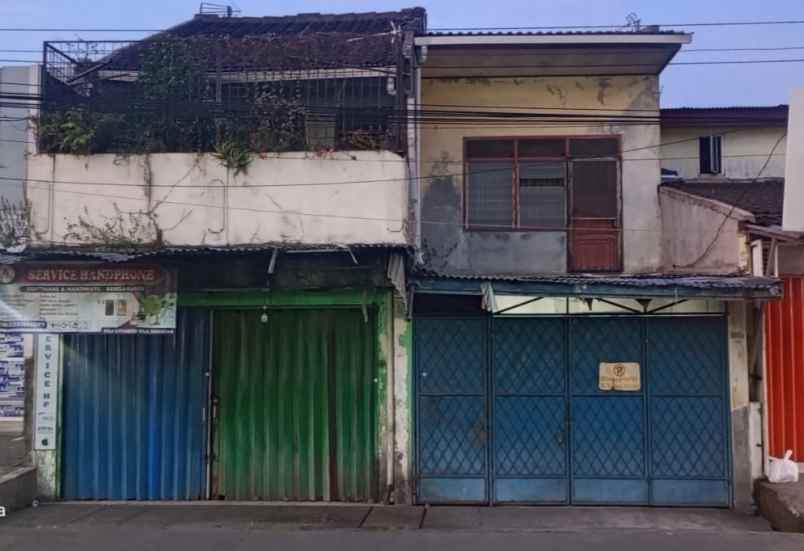 dijual rumah pinggir jalan raya