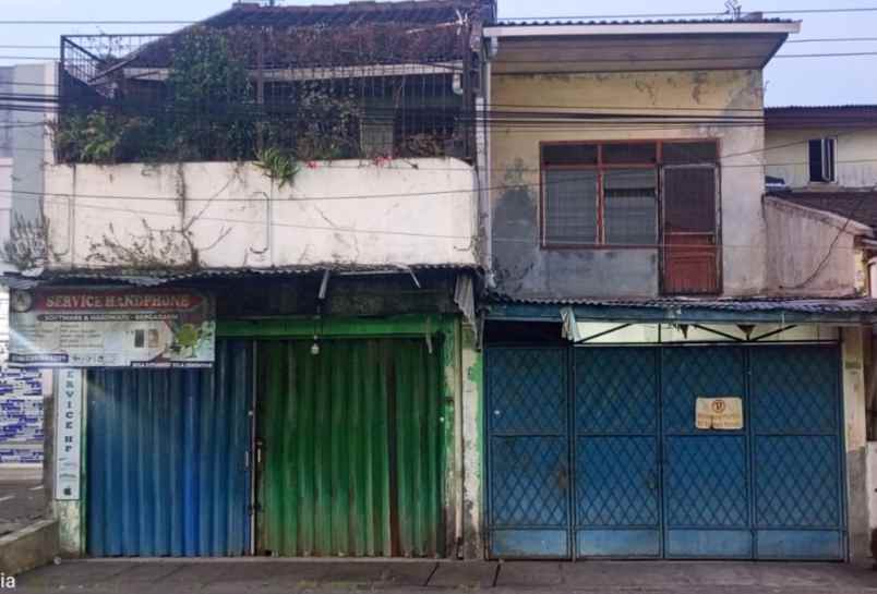 dijual rumah pinggir jalan raya