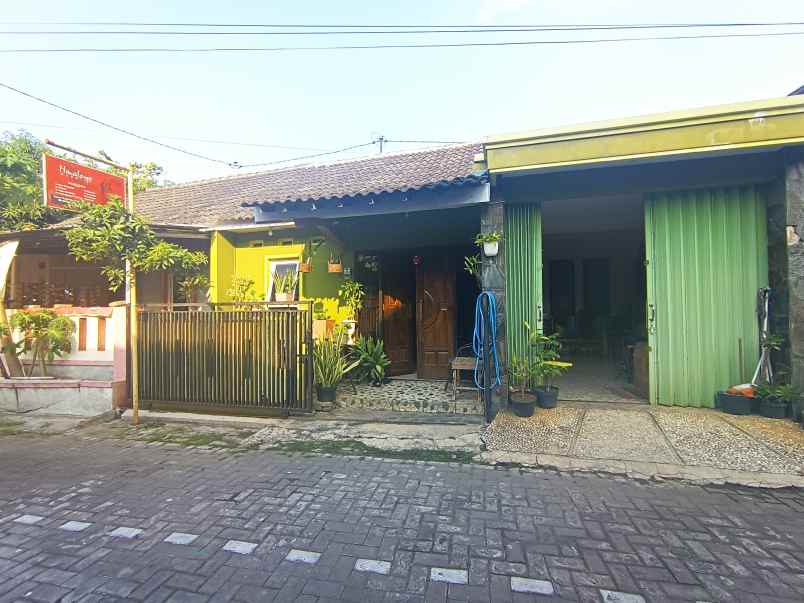 rumah cluster di woltermangunsidi harga 300jt an