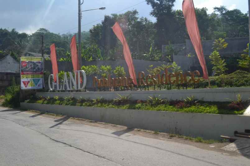 rumah jl g a manulang no 100