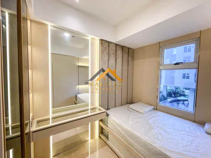 dijual apartemen podomoro city deli tower