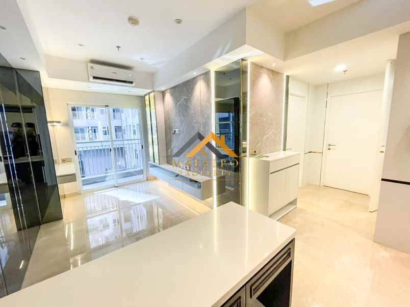 dijual apartemen podomoro city deli tower