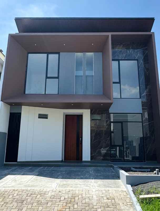 dijual rumah citraland cluster woodland