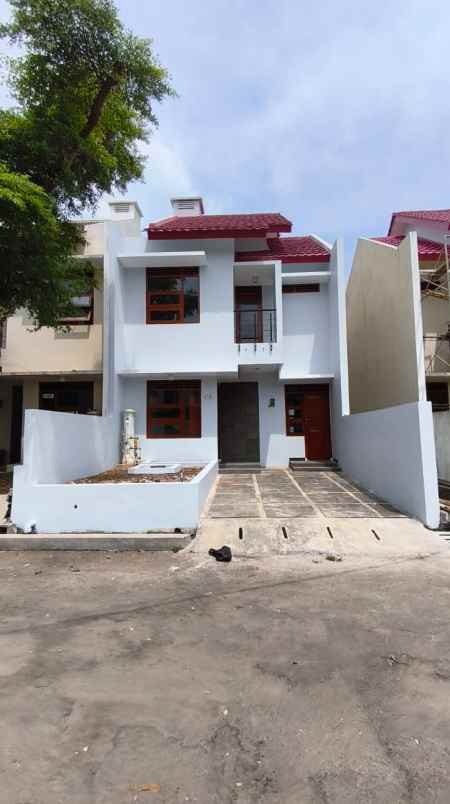 dijual rumah cluster madany regecy