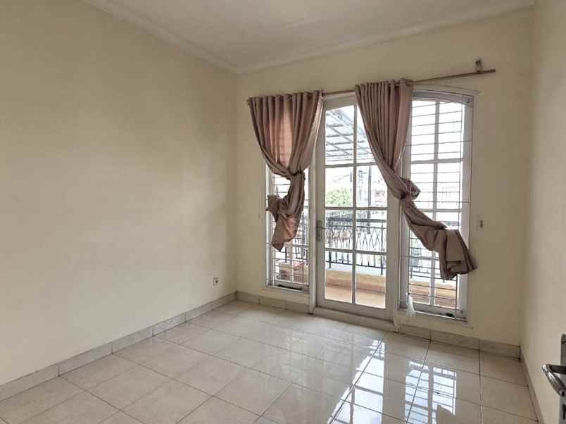 dijual rumah cluster taman puspa kota