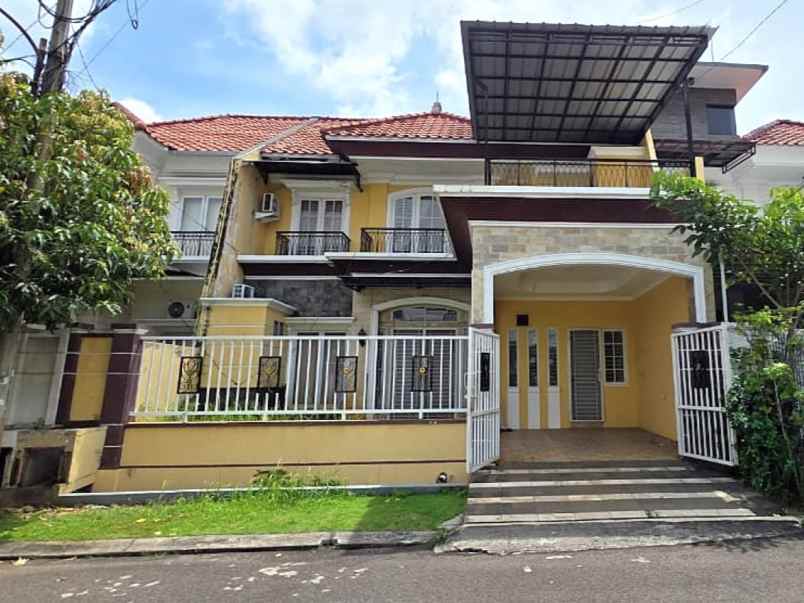 dijual rumah cluster taman puspa kota
