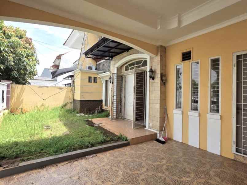 dijual rumah cluster taman puspa kota