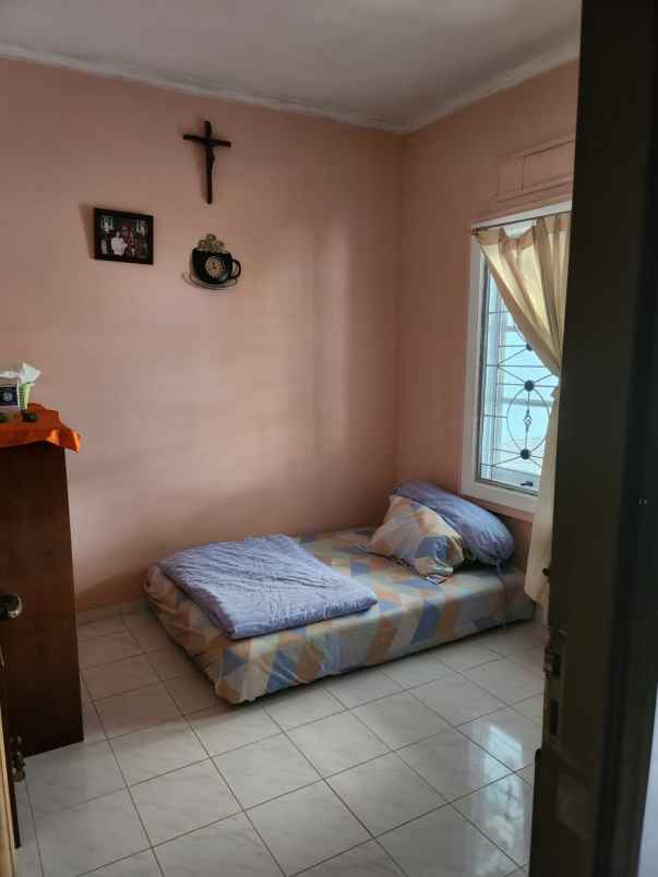 dijual rumah cluster tjikini metland