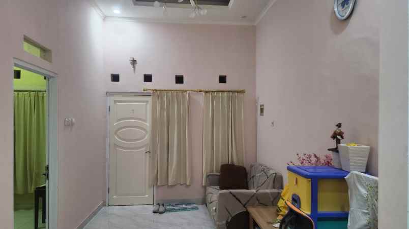 dijual rumah cluster tjikini metland