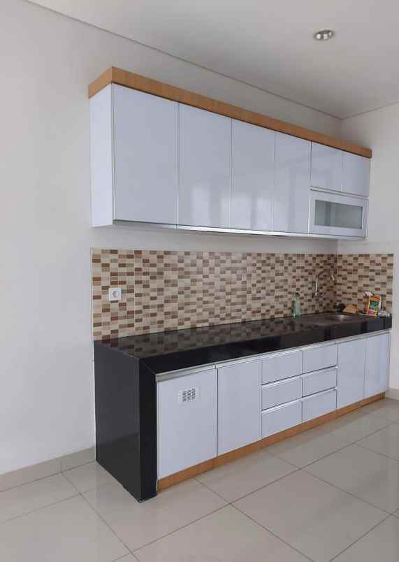 dijual rumah cosmo estate full renovasi lippo cikarang