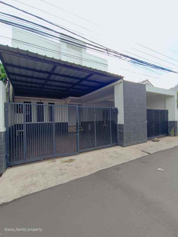 dijual rumah jalan raya permata hijau