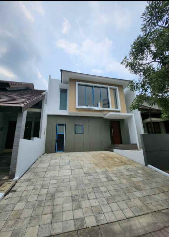 dijual rumah jalan woodland citraland