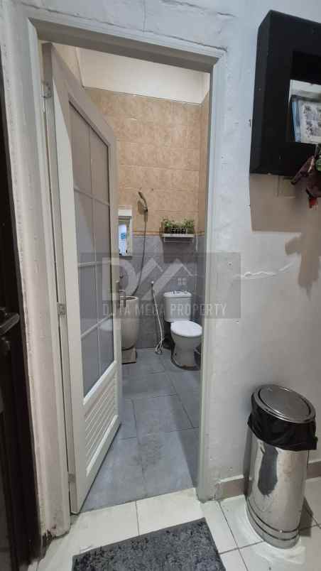 dijual rumah klub keluarga graha raya