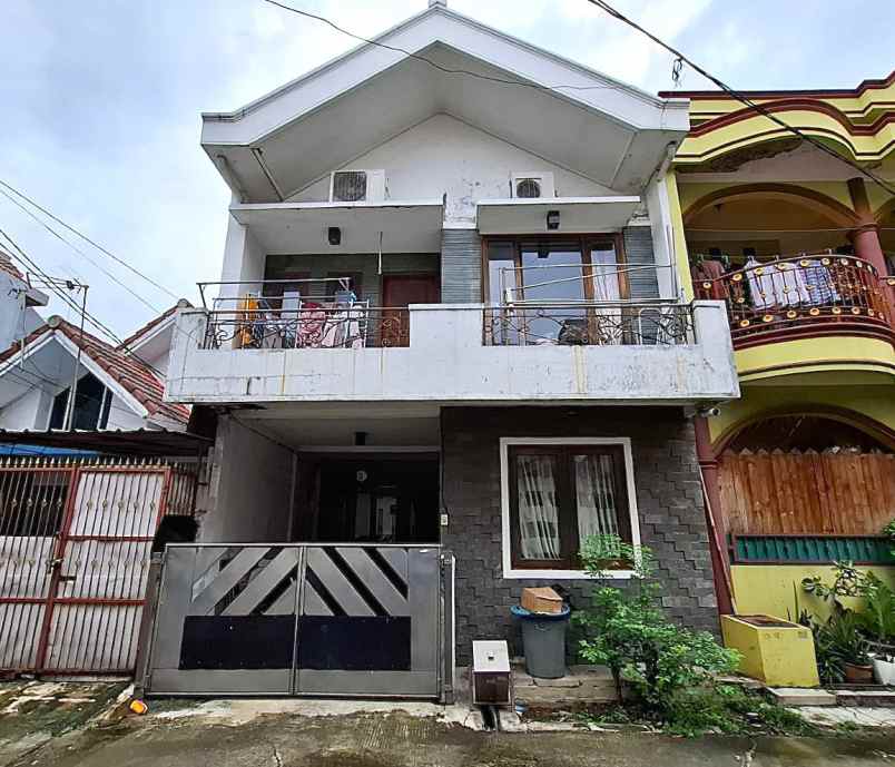 dijual rumah perumahan taman harapan