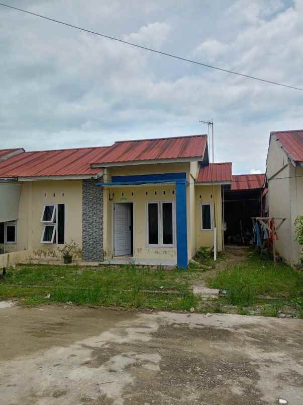 over kredit rumah subsidi jln beringin ujung air hitam